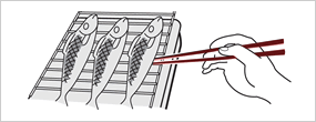 箸をグリル焼き網と平行に入れて取り出しましょう
